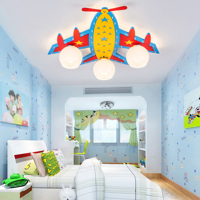Kids Propeller Plane Flush Ceiling Light Wood Blue Ceiling Lamp for Living Room Baby Bedroom Clearhalo 'Ceiling Lights' 'Close To Ceiling Lights' 'Close to ceiling' 'Glass shade' 'Glass' Lighting' 201856