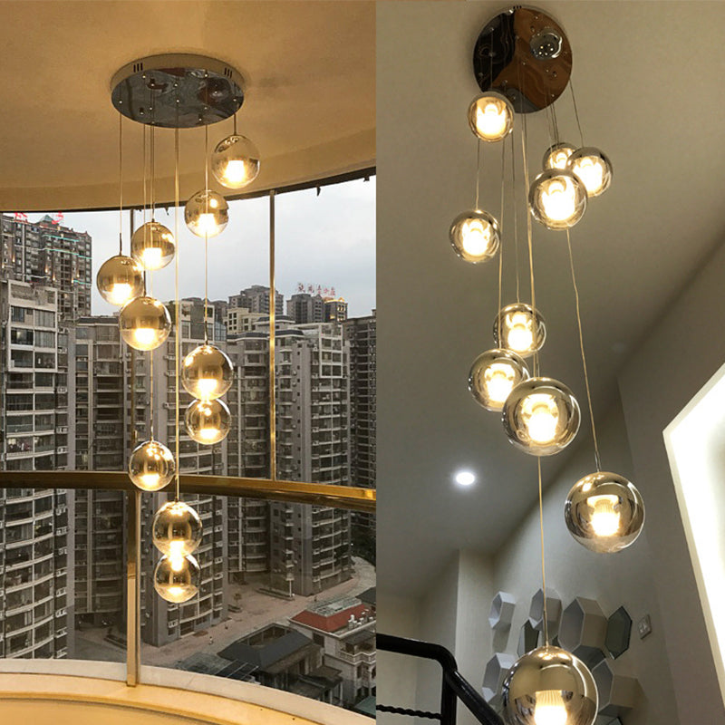 Globe Cluster Pendant Light Nordic Aluminum Stairs Suspension Lighting with Clear Glass Bottom in Gold 6 Gold Clearhalo 'Ceiling Lights' 'Glass shade' 'Glass' 'Modern Pendants' 'Modern' 'Pendant Lights' 'Pendants' Lighting' 2025344