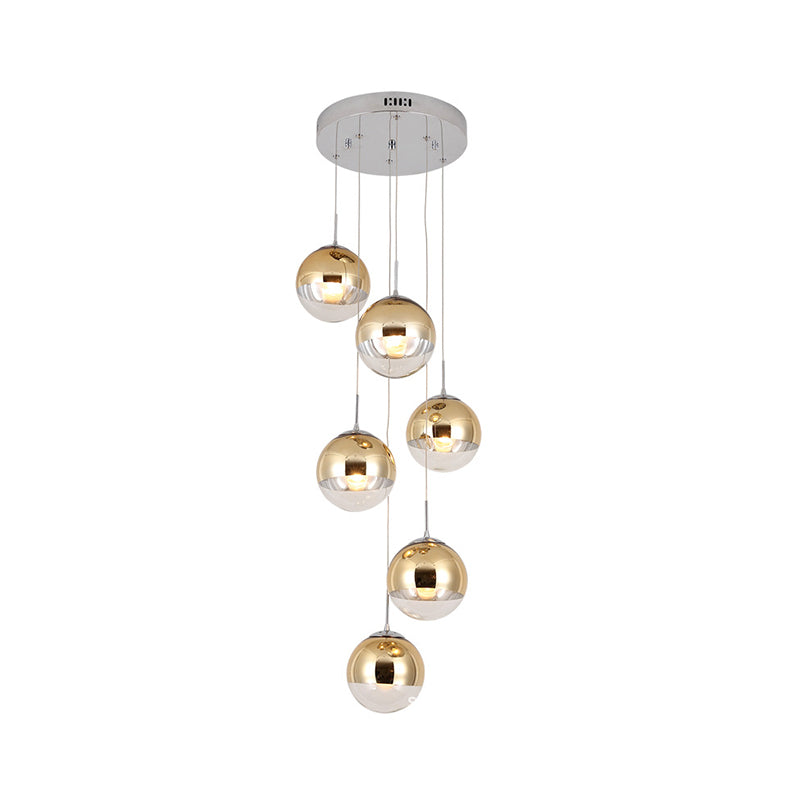 Globe Cluster Pendant Light Nordic Aluminum Stairs Suspension Lighting with Clear Glass Bottom in Gold Clearhalo 'Ceiling Lights' 'Glass shade' 'Glass' 'Modern Pendants' 'Modern' 'Pendant Lights' 'Pendants' Lighting' 2025346