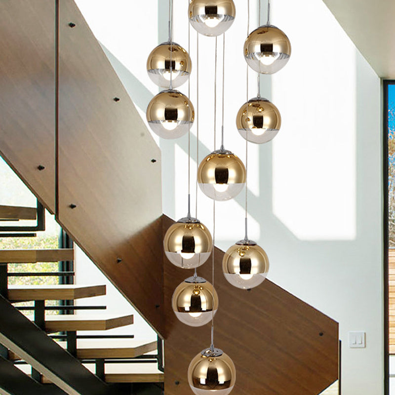 Globe Cluster Pendant Light Nordic Aluminum Stairs Suspension Lighting with Clear Glass Bottom in Gold Clearhalo 'Ceiling Lights' 'Glass shade' 'Glass' 'Modern Pendants' 'Modern' 'Pendant Lights' 'Pendants' Lighting' 2025349