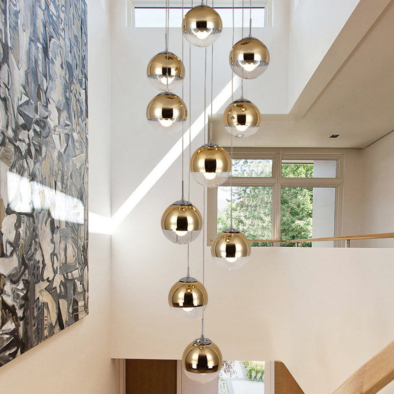 Globe Cluster Pendant Light Nordic Aluminum Stairs Suspension Lighting with Clear Glass Bottom in Gold Clearhalo 'Ceiling Lights' 'Glass shade' 'Glass' 'Modern Pendants' 'Modern' 'Pendant Lights' 'Pendants' Lighting' 2025350