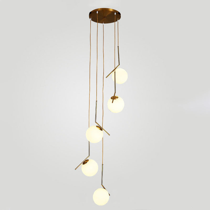 Minimalist Sphere Multi Light Pendant Opal Glass Living Room Suspension Lamp with Metal Arm 5 Gold Clearhalo 'Ceiling Lights' 'Modern Pendants' 'Modern' 'Pendant Lights' 'Pendants' Lighting' 2025355