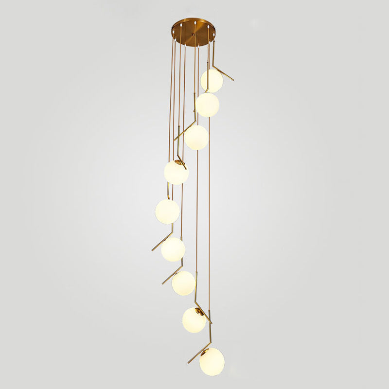 Minimalist Sphere Multi Light Pendant Opal Glass Living Room Suspension Lamp with Metal Arm 9 Gold Clearhalo 'Ceiling Lights' 'Modern Pendants' 'Modern' 'Pendant Lights' 'Pendants' Lighting' 2025362