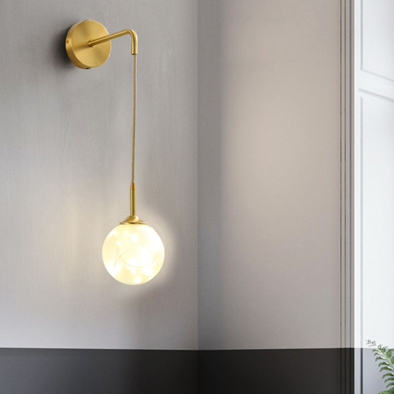 LED Bedroom Wall Light Fixture Minimalist Gold Wall Lamp Sconce with Geometrical Glass Shade Cream Long Arm Clearhalo 'Cast Iron' 'Glass' 'Industrial' 'Modern wall lights' 'Modern' 'Tiffany' 'Traditional wall lights' 'Wall Lamps & Sconces' 'Wall Lights' Lighting' 2026109