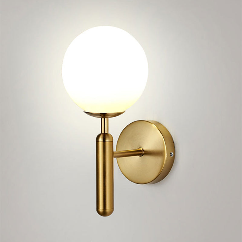 Minimalist Globe Wall Mount Light Fixture Glass 1-Head Bedroom Wall Lighting Ideas Gold White Clearhalo 'Cast Iron' 'Glass' 'Industrial' 'Modern wall lights' 'Modern' 'Tiffany' 'Traditional wall lights' 'Wall Lamps & Sconces' 'Wall Lights' Lighting' 2038864