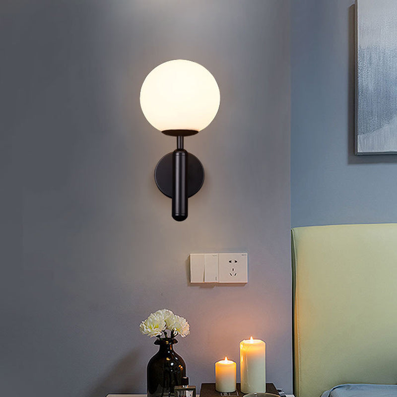 Minimalist Globe Wall Mount Light Fixture Glass 1-Head Bedroom Wall Lighting Ideas Black White Clearhalo 'Cast Iron' 'Glass' 'Industrial' 'Modern wall lights' 'Modern' 'Tiffany' 'Traditional wall lights' 'Wall Lamps & Sconces' 'Wall Lights' Lighting' 2038866