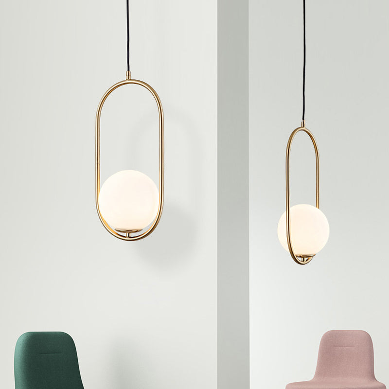 Opal Glass Globe Drop Pendant Modern 1-Bulb Gold Hanging Light Kit with Oval Frame Clearhalo 'Ceiling Lights' 'Glass shade' 'Glass' 'Modern Pendants' 'Modern' 'Pendant Lights' 'Pendants' Lighting' 2038995