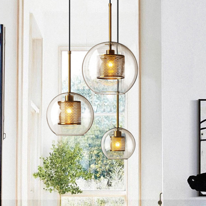 Clear Glass Orb Pendant Lighting Modernity 1 Head Hanging Ceiling Light with Inside Mesh Cage Clearhalo 'Ceiling Lights' 'Glass shade' 'Glass' 'Modern Pendants' 'Modern' 'Pendant Lights' 'Pendants' Lighting' 2039045