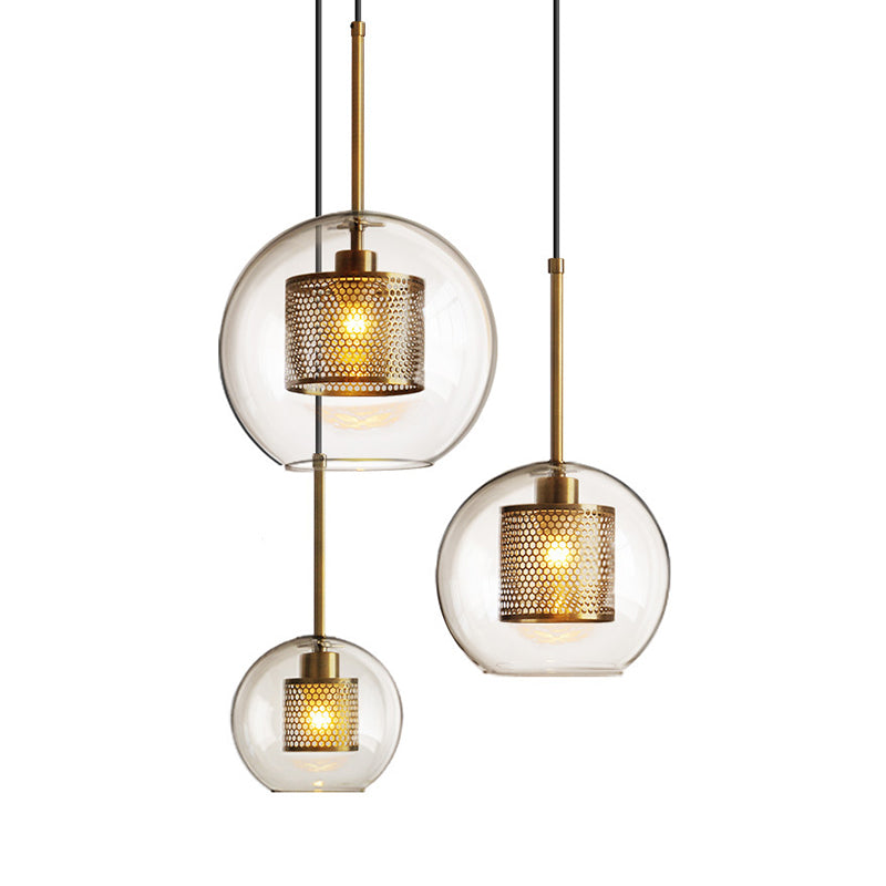 Clear Glass Orb Pendant Lighting Modernity 1 Head Hanging Ceiling Light with Inside Mesh Cage Clearhalo 'Ceiling Lights' 'Glass shade' 'Glass' 'Modern Pendants' 'Modern' 'Pendant Lights' 'Pendants' Lighting' 2039046