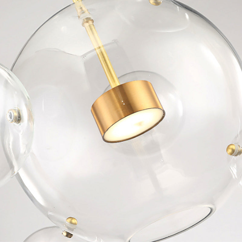 Brass Bubble Cluster Pendant Light Minimal 5 Heads Clear Glass Ceiling Suspension Lamp Clearhalo 'Ceiling Lights' 'Glass shade' 'Glass' 'Island Lights' 'Modern Pendants' 'Modern' 'Pendant Lights' 'Pendants' Lighting' 2039071