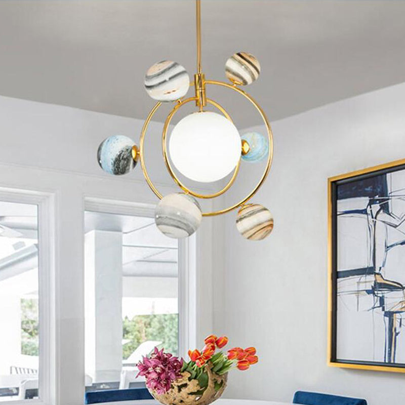 Stained Glass Solar System Chandelier Modern Style Pendant Light Kit in Gold for Living Room 7 Gold Downrods Clearhalo 'Ceiling Lights' 'Chandeliers' 'Glass shade' 'Glass' 'Modern Chandeliers' 'Modern' Lighting' 2039418