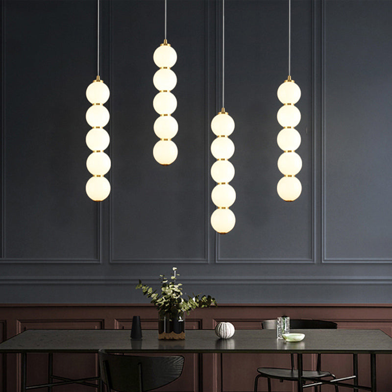 Sugar-Coated Haws Opal Glass Chandelier Minimal 5-Light Gold Pendant Light Kit for Dining Room Clearhalo 'Ceiling Lights' 'Chandeliers' 'Glass shade' 'Glass' 'Modern Chandeliers' 'Modern' Lighting' 2039439