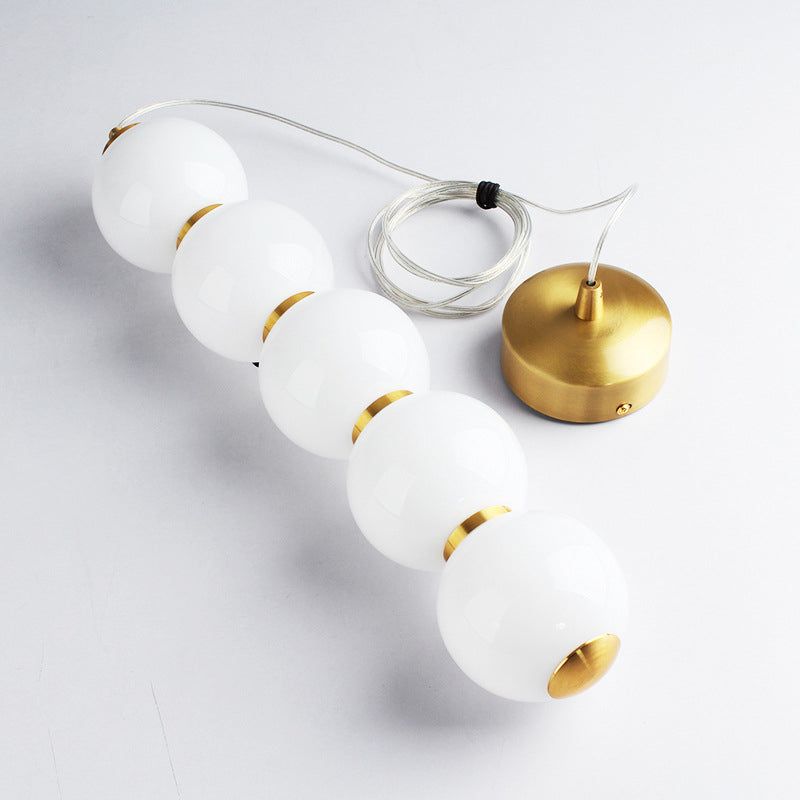 Sugar-Coated Haws Opal Glass Chandelier Minimal 5-Light Gold Pendant Light Kit for Dining Room Clearhalo 'Ceiling Lights' 'Chandeliers' 'Glass shade' 'Glass' 'Modern Chandeliers' 'Modern' Lighting' 2039442