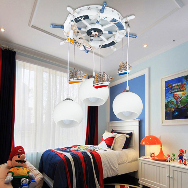 Milk Glass Orb Ceiling Pendant with Rudder & Ship Child Bedroom 3 Lights Nautical Hanging Light in White Clearhalo 'Ceiling Lights' 'Pendant Lights' 'Pendants' Lighting' 204924