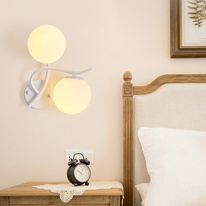 Simple Style Globe Wall Lamp 2 Heads Milk Glass Sconce Light in White for Adult Bedroom Clearhalo 'Wall Lamps & Sconces' 'Wall Lights' Lighting' 205722