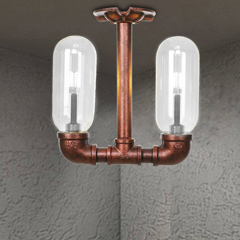 Capsule Dining Room Semi Flush Industrial Clear Glass 2 Lights Weathered Copper Ceiling Lighting with Pipe Design Clearhalo 'Ceiling Lights' 'Close To Ceiling Lights' 'Close to ceiling' 'Semi-flushmount' Lighting' 206193