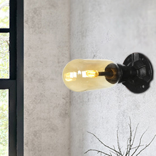 1/2 Bulb Wall Light Capsule Amber Glass Industrial Dining Room Sconce Lighting Fixture in Black with Pipe Design Clearhalo 'Art deco wall lights' 'Cast Iron' 'Glass' 'Industrial wall lights' 'Industrial' 'Middle century wall lights' 'Modern' 'Rustic wall lights' 'Tiffany' 'Traditional wall lights' 'Wall Lamps & Sconces' 'Wall Lights' Lighting' 208437