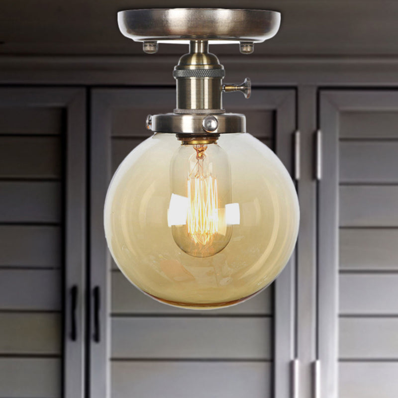 1 Light Globe/Round Semi Flush Light Industrial Bronze Clear/Amber Glass Lighting Fixture for Indoor Amber Globe Clearhalo 'Ceiling Lights' 'Close To Ceiling Lights' 'Close to ceiling' 'Glass shade' 'Glass' 'Semi-flushmount' Lighting' 209367