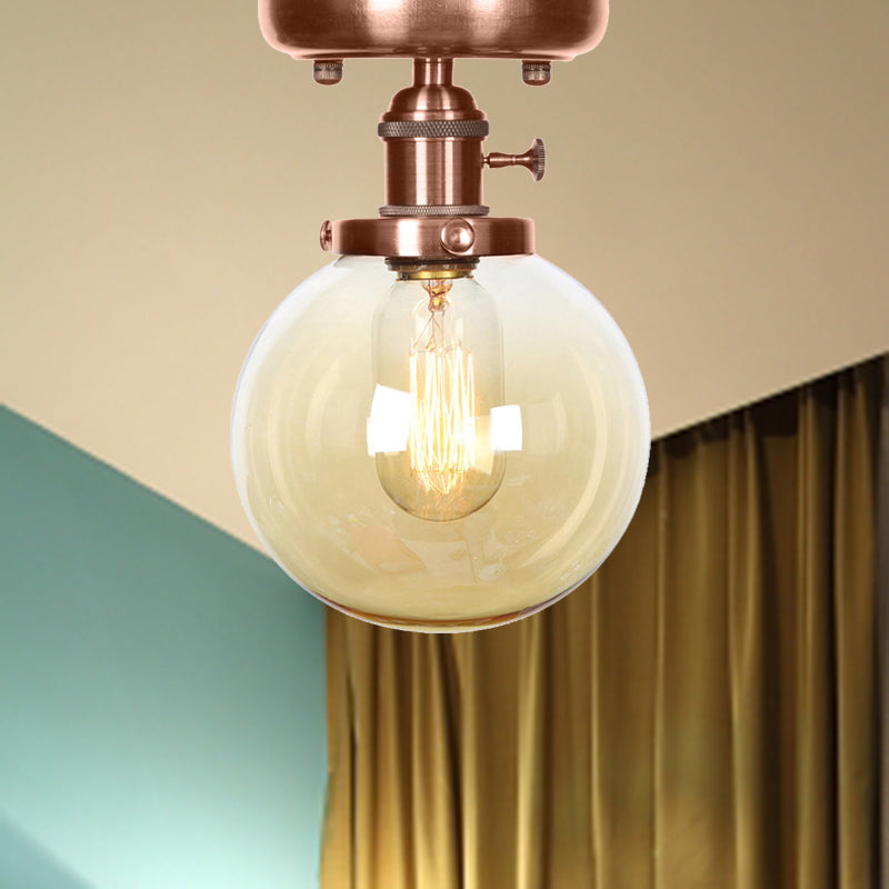 Globe/Round Clear/Amber Glass Semi Mount Lighting Industrial 1 Bulb Living Room Ceiling Light in Copper Amber Globe Clearhalo 'Ceiling Lights' 'Close To Ceiling Lights' 'Close to ceiling' 'Glass shade' 'Glass' 'Semi-flushmount' Lighting' 209472
