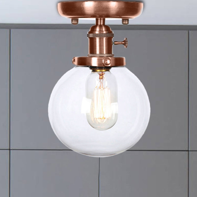 Globe/Round Clear/Amber Glass Semi Mount Lighting Industrial 1 Bulb Living Room Ceiling Light in Copper Clear Globe Clearhalo 'Ceiling Lights' 'Close To Ceiling Lights' 'Close to ceiling' 'Glass shade' 'Glass' 'Semi-flushmount' Lighting' 209475