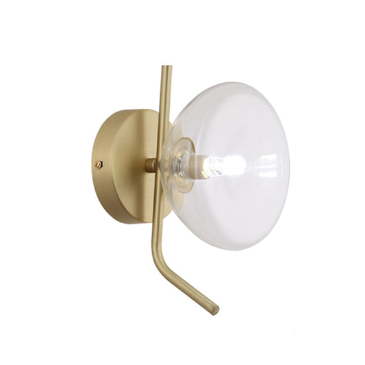 Clear Glass Dome Wall Mounted Light Postmodern 1 Light Sconce Light with Gold Arm Clearhalo 'Cast Iron' 'Glass' 'Industrial' 'Modern wall lights' 'Modern' 'Tiffany' 'Traditional wall lights' 'Wall Lamps & Sconces' 'Wall Lights' Lighting' 210093