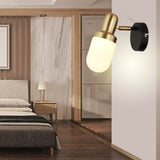 Modern Capsule Glass Sconce Light 1/2/3 Lights Wall Mount Light with Black Arm and Backplate 1.0 Black Clearhalo 'Cast Iron' 'Glass' 'Industrial' 'Modern wall lights' 'Modern' 'Tiffany' 'Traditional wall lights' 'Wall Lamps & Sconces' 'Wall Lights' Lighting' 210126