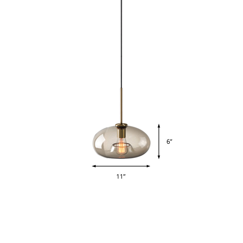 1 Light Dining Room Suspension Lamp with Oval/Drum/Cylinder Clear Glass Shade Contemporary Brass Ceiling Pendant Light, 7"/10"/11" Wide Clearhalo 'Ceiling Lights' 'Glass shade' 'Glass' 'Modern Pendants' 'Modern' 'Pendant Lights' 'Pendants' Lighting' 211123