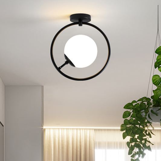 Sphere Semi Flush Mount Modernist White/Yellow Glass 1 Light Black Semi Flush Mount Light Fixture with Iron Ring White Clearhalo 'Ceiling Lights' 'Close To Ceiling Lights' 'Close to ceiling' 'Glass shade' 'Glass' 'Semi-flushmount' Lighting' 212408