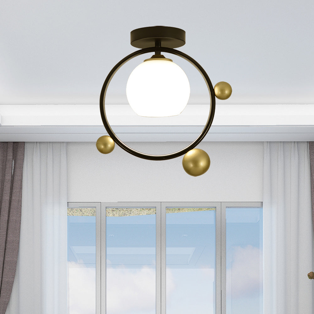 White Glass Sphere Semi Flush Mount Modernist 1 Light Black Semi Flush Mount Light Fixture with Iron Ring, 10"/12" Wide Clearhalo 'Ceiling Lights' 'Close To Ceiling Lights' 'Close to ceiling' 'Glass shade' 'Glass' 'Semi-flushmount' Lighting' 212441
