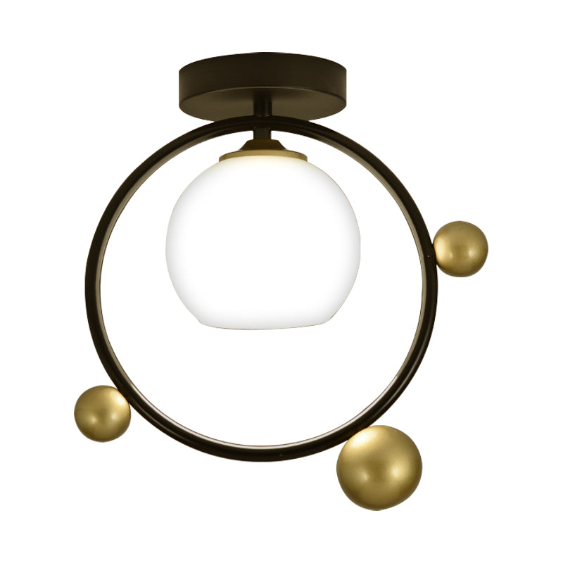 White Glass Sphere Semi Flush Mount Modernist 1 Light Black Semi Flush Mount Light Fixture with Iron Ring, 10"/12" Wide Clearhalo 'Ceiling Lights' 'Close To Ceiling Lights' 'Close to ceiling' 'Glass shade' 'Glass' 'Semi-flushmount' Lighting' 212443