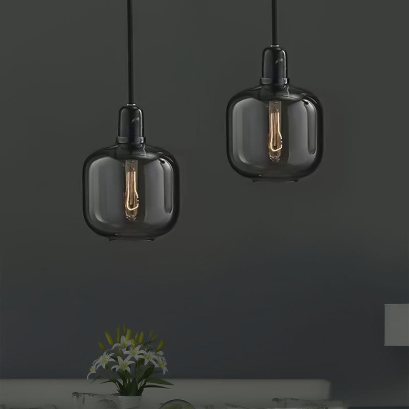 Modernist Cylinder Pendant Amber/Smoky Glass 1 Light Living Room Hanging Ceiling Lamp, 4"/5.5" Wide Smoke Gray 5.5" Clearhalo 'Ceiling Lights' 'Close To Ceiling Lights' 'Glass shade' 'Glass' 'Modern Pendants' 'Modern' 'Pendant Lights' 'Pendants' Lighting' 212970