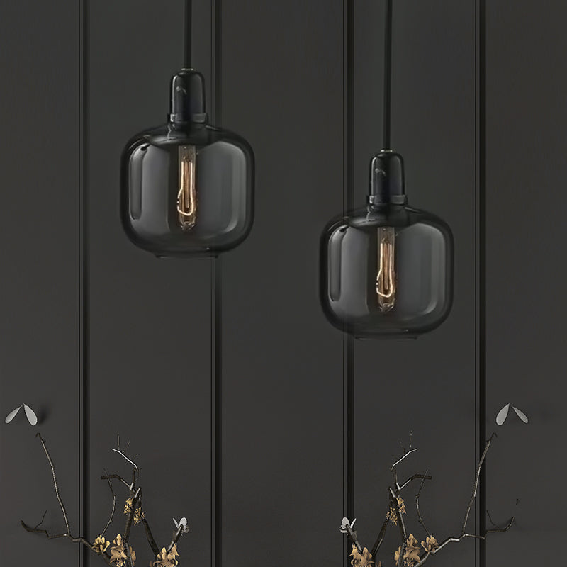 Modernist Cylinder Pendant Amber/Smoky Glass 1 Light Living Room Hanging Ceiling Lamp, 4"/5.5" Wide Clearhalo 'Ceiling Lights' 'Close To Ceiling Lights' 'Glass shade' 'Glass' 'Modern Pendants' 'Modern' 'Pendant Lights' 'Pendants' Lighting' 212971