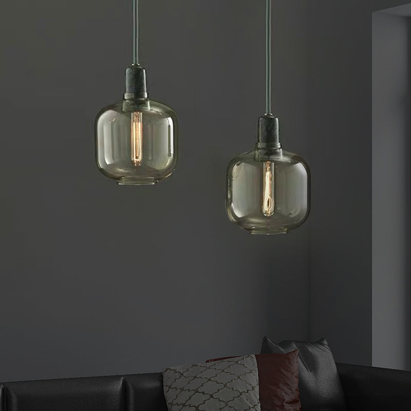 Modernist Cylinder Pendant Amber/Smoky Glass 1 Light Living Room Hanging Ceiling Lamp, 4"/5.5" Wide Amber 5.5" Clearhalo 'Ceiling Lights' 'Close To Ceiling Lights' 'Glass shade' 'Glass' 'Modern Pendants' 'Modern' 'Pendant Lights' 'Pendants' Lighting' 212977