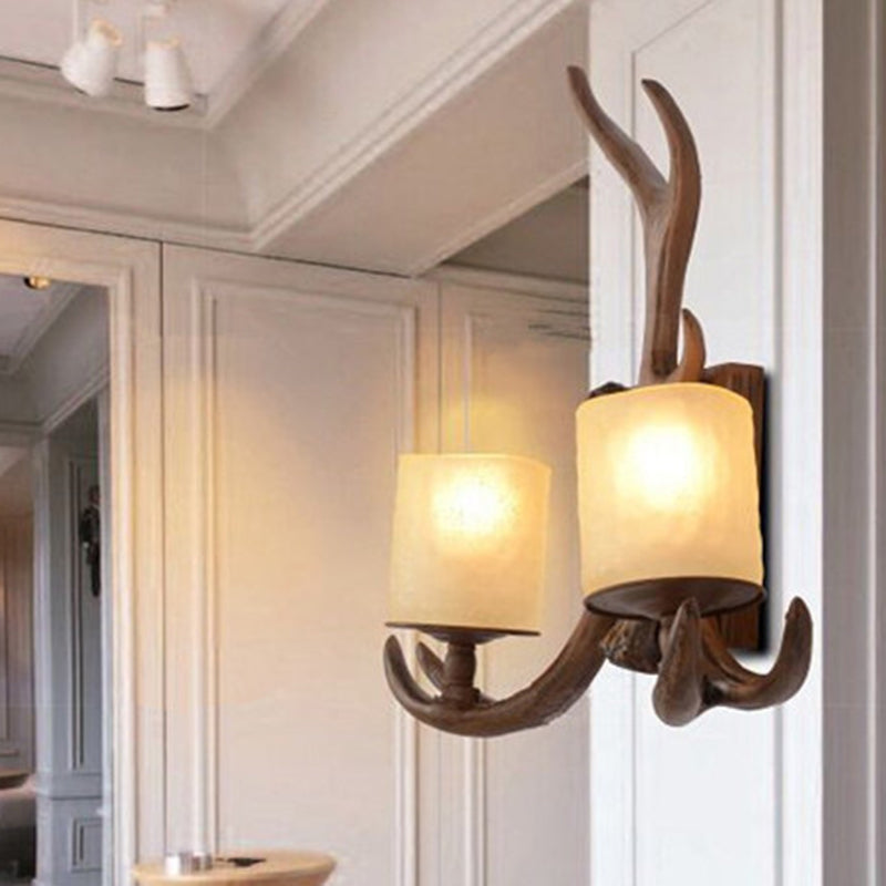 Brown Cylinder Wall Lamp Rustic Frost Glass 2 Bulbs Living Room Wall Light Fixture with Decorative Antler Clearhalo 'Wall Lamps & Sconces' 'Wall Lights' Lighting' 2135825