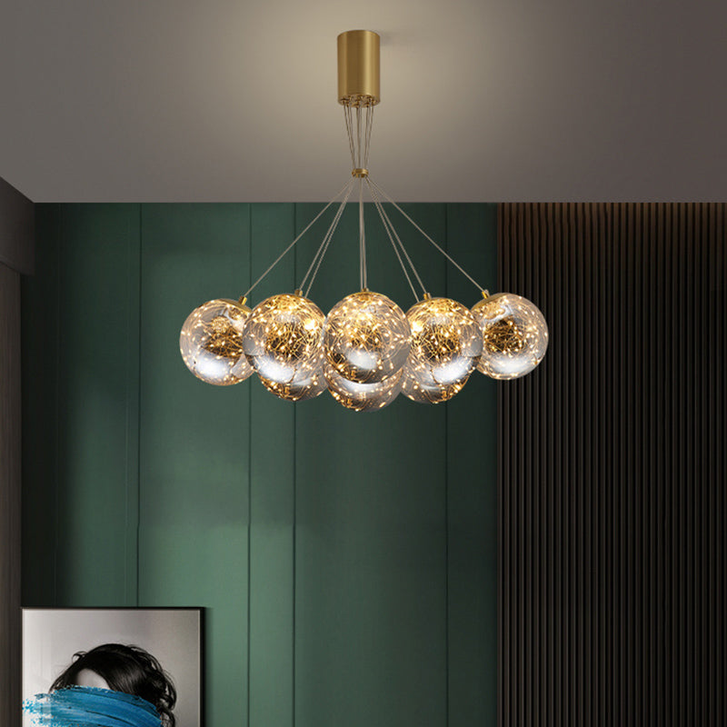Sphere Handblown Glass LED Multi Light Pendant Modern Brass Starry Hanging Lighting Clearhalo 'Ceiling Lights' 'Modern Pendants' 'Modern' 'Pendant Lights' 'Pendants' Lighting' 2162527