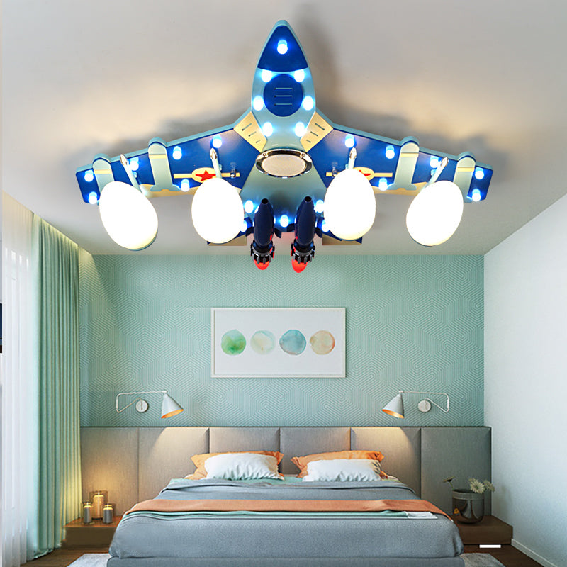 Blue Plane Flush Mount Lamp Cartoon Style 3/4 Bulbs Wood Ceiling Lighting with Milk Glass Teardrop Shade 4 Blue Clearhalo 'Ceiling Lights' 'Close To Ceiling Lights' 'Close to ceiling' 'Flush mount' Lighting' 216421