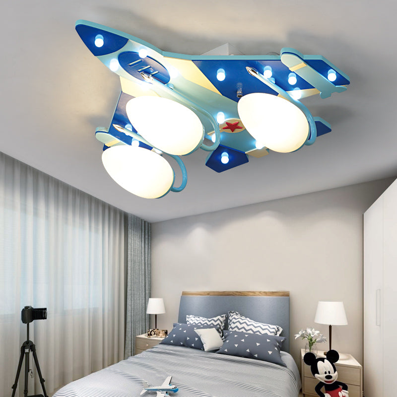 Blue Plane Flush Mount Lamp Cartoon Style 3/4 Bulbs Wood Ceiling Lighting with Milk Glass Teardrop Shade 3 Blue Clearhalo 'Ceiling Lights' 'Close To Ceiling Lights' 'Close to ceiling' 'Flush mount' Lighting' 216425