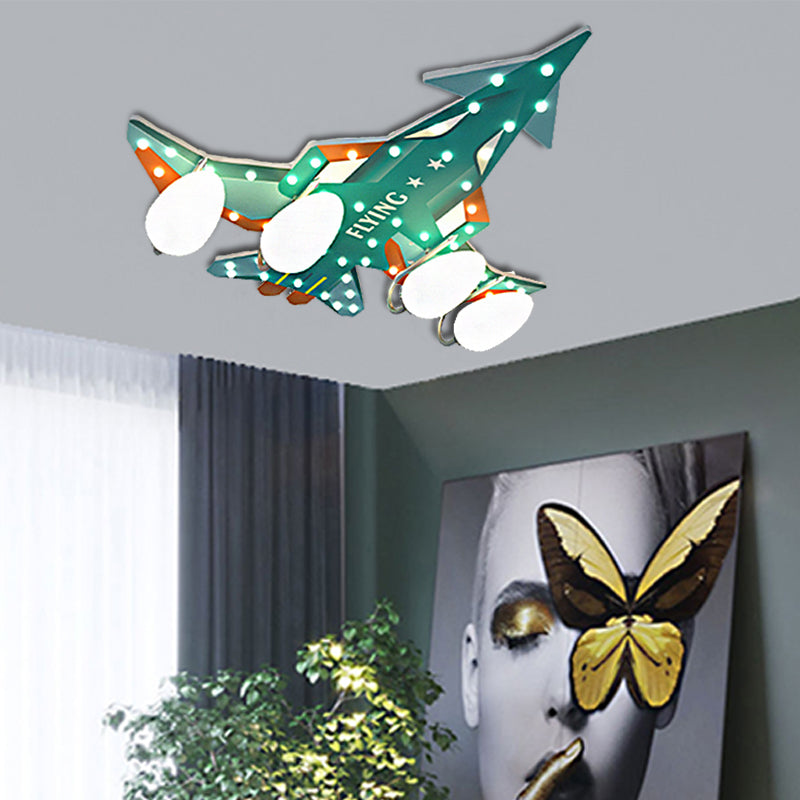 Blue/Green Finish Aircraft Flush Pendant Light Modernist 4 Lights Plastic and Opal Glass Ceiling Lamp for Children Room Clearhalo 'Ceiling Lights' 'Chandeliers' 'Close To Ceiling Lights' 'Close to ceiling' 'Glass shade' 'Glass' 'Semi-flushmount' Lighting' 217703