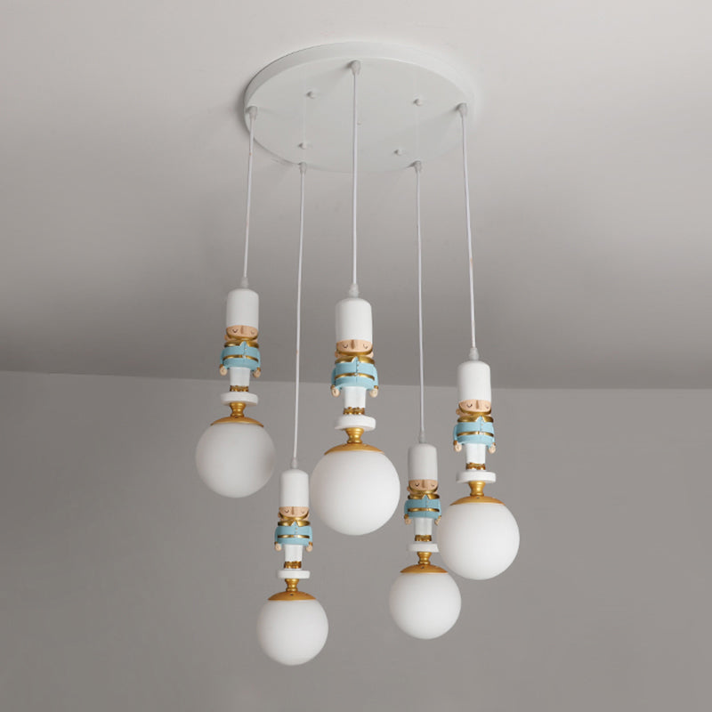 Sphere Shade Bedroom Multi Ceiling Light Cream Glass Kids Multi Light Pendant with Decorative Figurine 5 White Clearhalo 'Ceiling Lights' 'Close To Ceiling Lights' 'Glass shade' 'Glass' 'Pendant Lights' 'Pendants' Lighting' 2187809