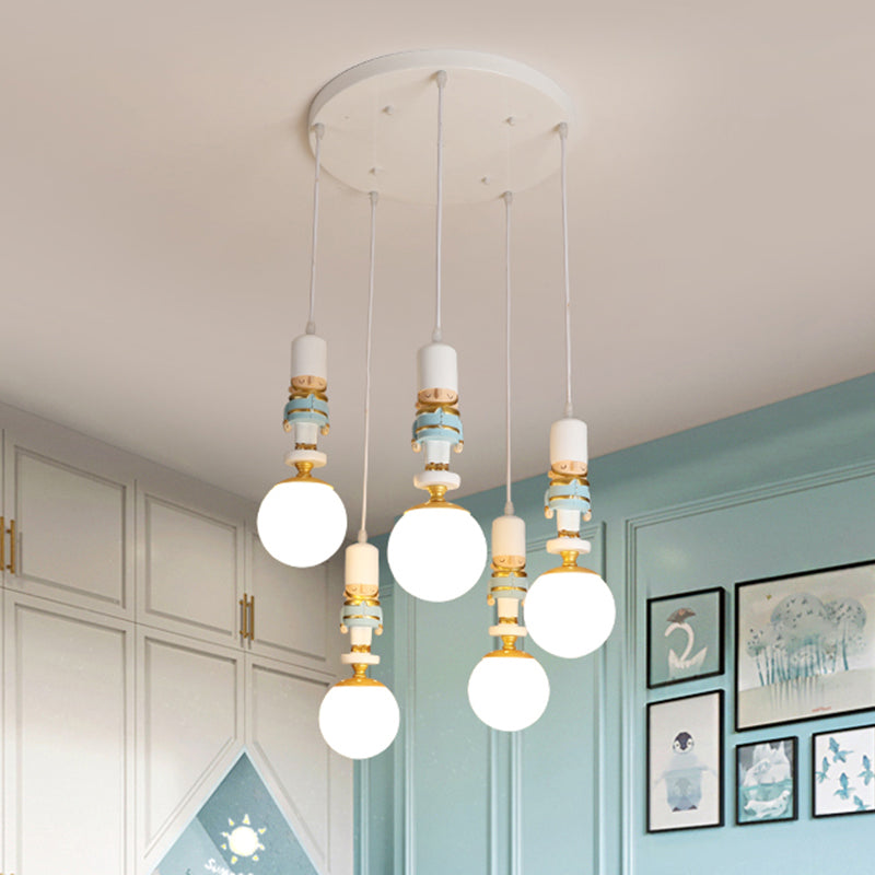 Sphere Shade Bedroom Multi Ceiling Light Cream Glass Kids Multi Light Pendant with Decorative Figurine Clearhalo 'Ceiling Lights' 'Close To Ceiling Lights' 'Glass shade' 'Glass' 'Pendant Lights' 'Pendants' Lighting' 2187810