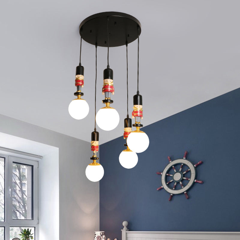 Sphere Shade Bedroom Multi Ceiling Light Cream Glass Kids Multi Light Pendant with Decorative Figurine 5 Black Clearhalo 'Ceiling Lights' 'Close To Ceiling Lights' 'Glass shade' 'Glass' 'Pendant Lights' 'Pendants' Lighting' 2187817