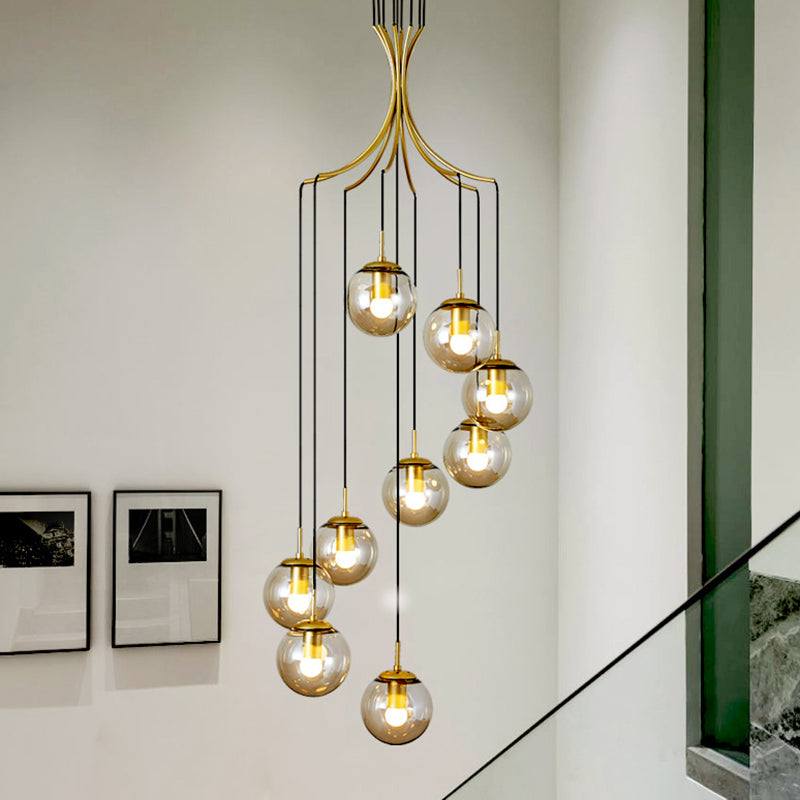 Globe Staircase Multi Ceiling Lamp Frost Glass Contemporary Suspension Light Fixture in Gold Clearhalo 'Ceiling Lights' 'Glass shade' 'Glass' 'Modern Pendants' 'Modern' 'Pendant Lights' 'Pendants' Lighting' 2197506
