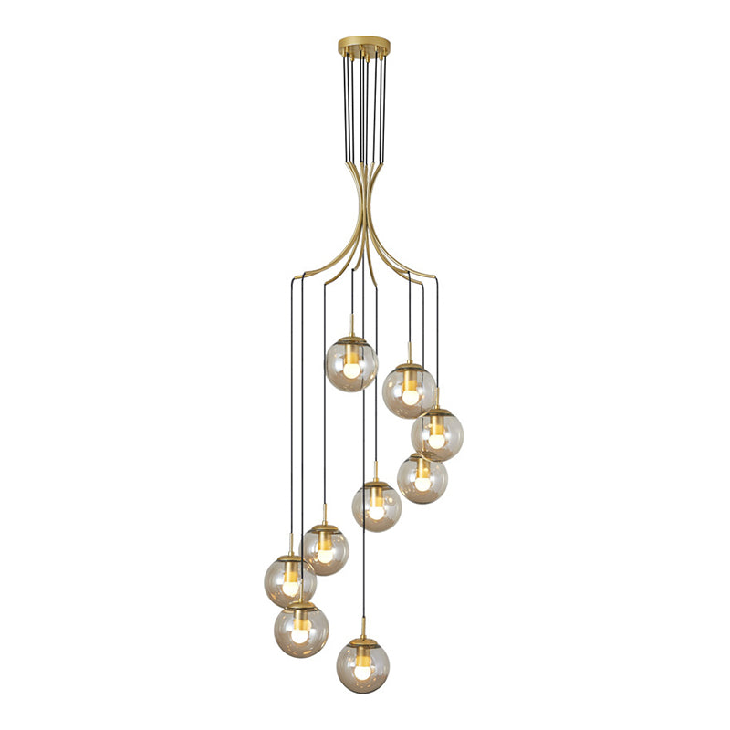 Globe Staircase Multi Ceiling Lamp Frost Glass Contemporary Suspension Light Fixture in Gold Clearhalo 'Ceiling Lights' 'Glass shade' 'Glass' 'Modern Pendants' 'Modern' 'Pendant Lights' 'Pendants' Lighting' 2197507