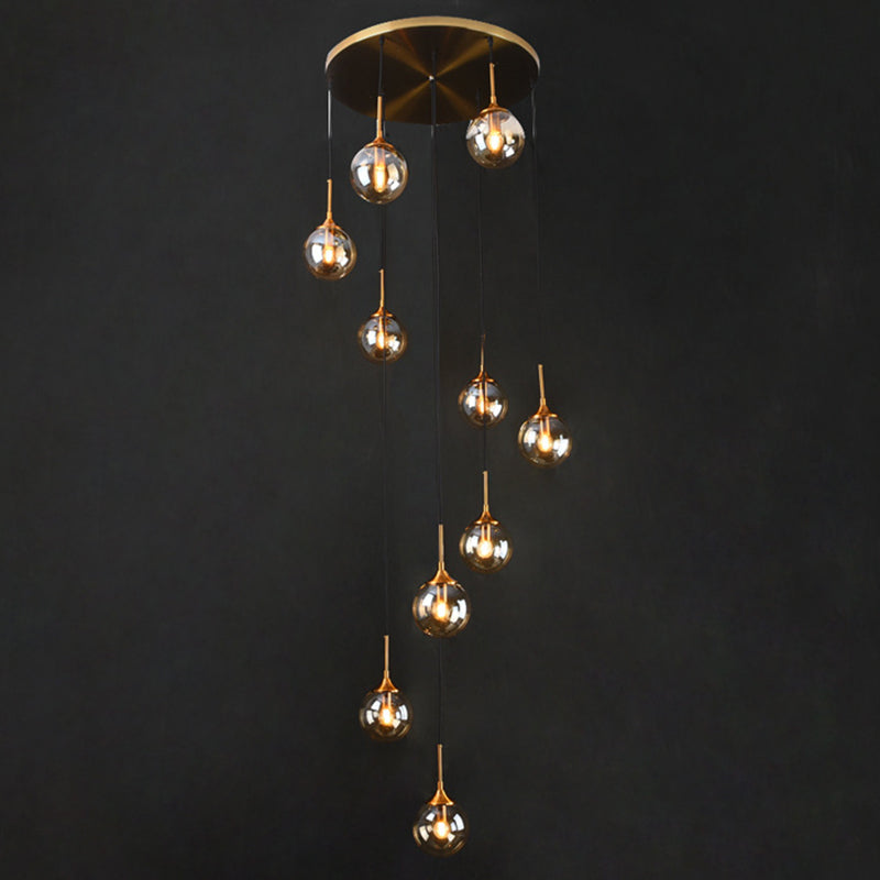 Nordic Style Spiral Ball Hanging Lighting Glass Staircase Multi Light Pendant 10 Amber A Clearhalo 'Ceiling Lights' 'Glass shade' 'Glass' 'Modern Pendants' 'Modern' 'Pendant Lights' 'Pendants' Lighting' 2197523