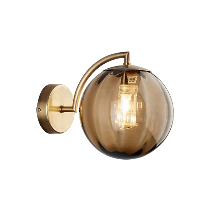 Postmodernist Brass Armed Ball Sconce Lamp Red/Blue/Amber Glass Single Light Wall Lighting Fixture Clearhalo 'Cast Iron' 'Glass' 'Industrial' 'Modern wall lights' 'Modern' 'Tiffany' 'Traditional wall lights' 'Wall Lamps & Sconces' 'Wall Lights' Lighting' 219791