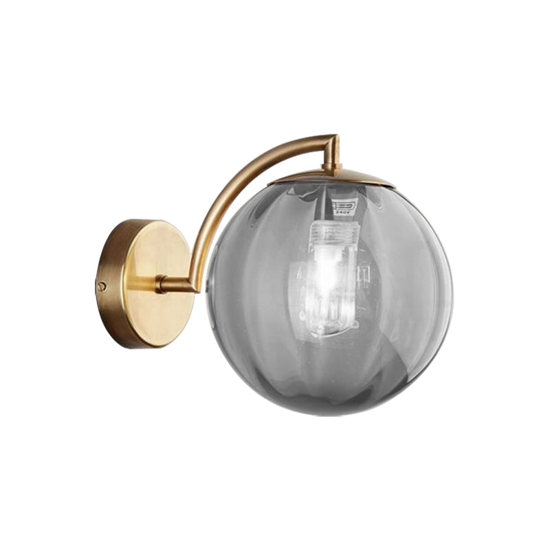 Postmodernist Brass Armed Ball Sconce Lamp Red/Blue/Amber Glass Single Light Wall Lighting Fixture Clearhalo 'Cast Iron' 'Glass' 'Industrial' 'Modern wall lights' 'Modern' 'Tiffany' 'Traditional wall lights' 'Wall Lamps & Sconces' 'Wall Lights' Lighting' 219793