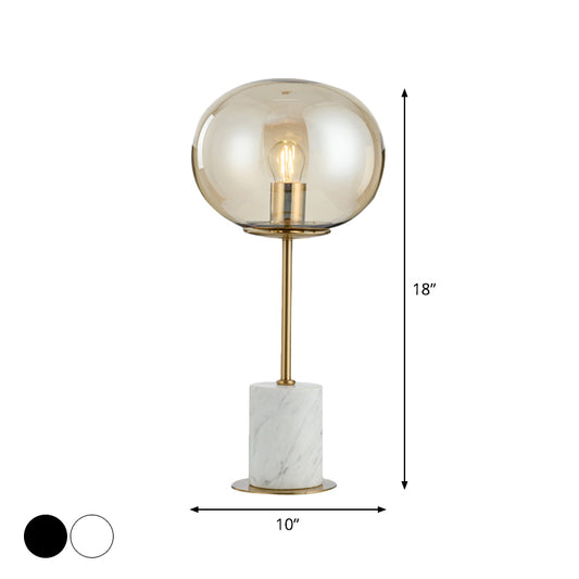 Oblate Bedside Nightstand Lamp Amber Glass 1 Bulb Minimalistic Table Light with Cylindrical Marble Base Clearhalo 'Lamps' 'Table Lamps' Lighting' 2204650