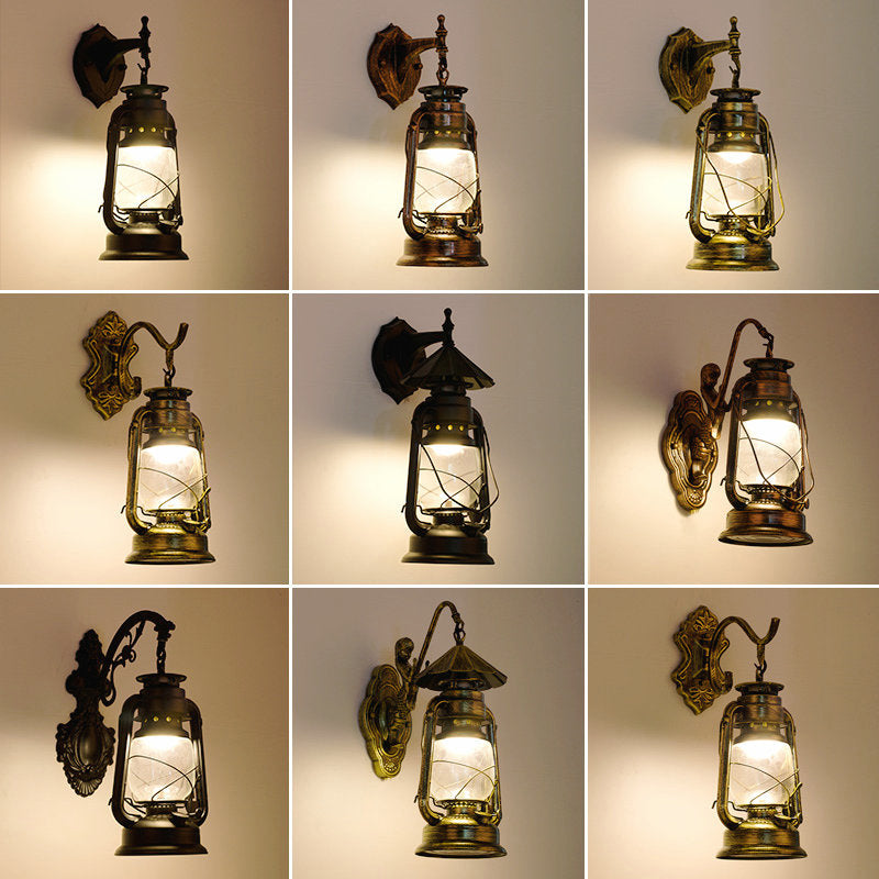 1-Light Wall Light Fixture Vintage Lantern Shaped Iron Kerosene Lighting for Restaurant Clearhalo 'Art deco wall lights' 'Cast Iron' 'Glass' 'Industrial wall lights' 'Industrial' 'Middle century wall lights' 'Modern' 'Rustic wall lights' 'Tiffany' 'Traditional wall lights' 'Wall Lamps & Sconces' 'Wall Lights' Lighting' 2216684