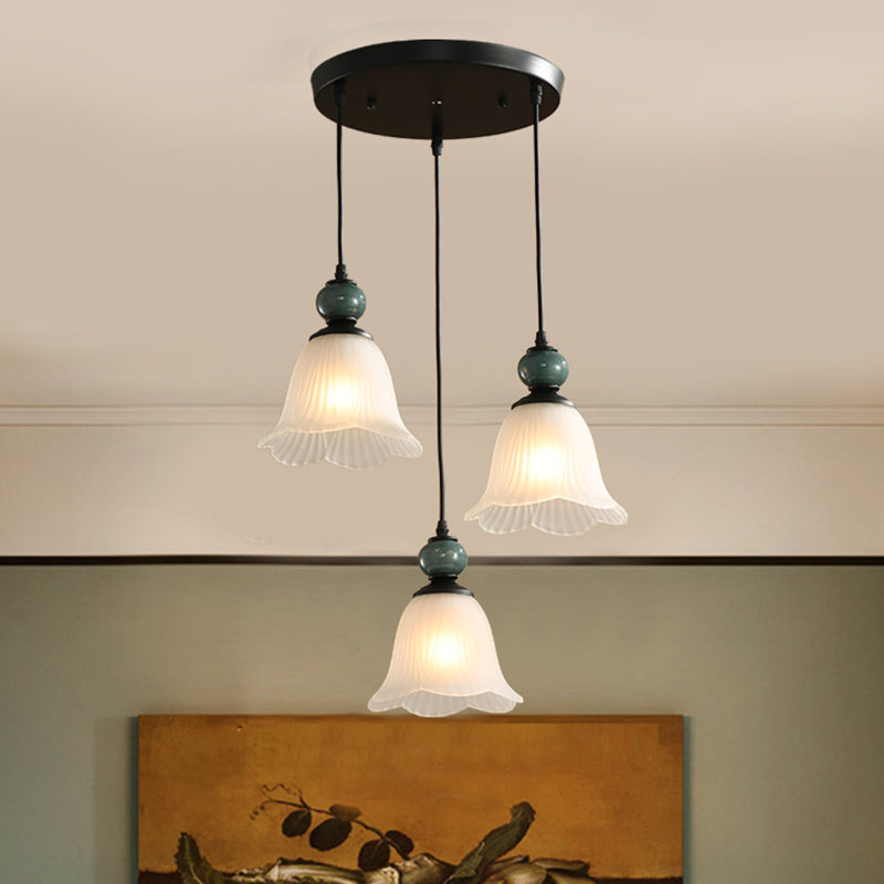 3 Bulbs Multi Light Pendant Retro Style Floral Shade Ribbed Ruffled Glass Hanging Lighting in Black Clearhalo 'Ceiling Lights' 'Glass shade' 'Glass' 'Pendant Lights' 'Pendants' Lighting' 2216735