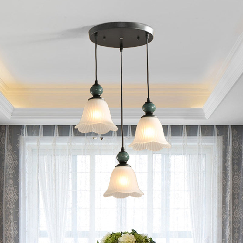 3 Bulbs Multi Light Pendant Retro Style Floral Shade Ribbed Ruffled Glass Hanging Lighting in Black Clearhalo 'Ceiling Lights' 'Glass shade' 'Glass' 'Pendant Lights' 'Pendants' Lighting' 2216737